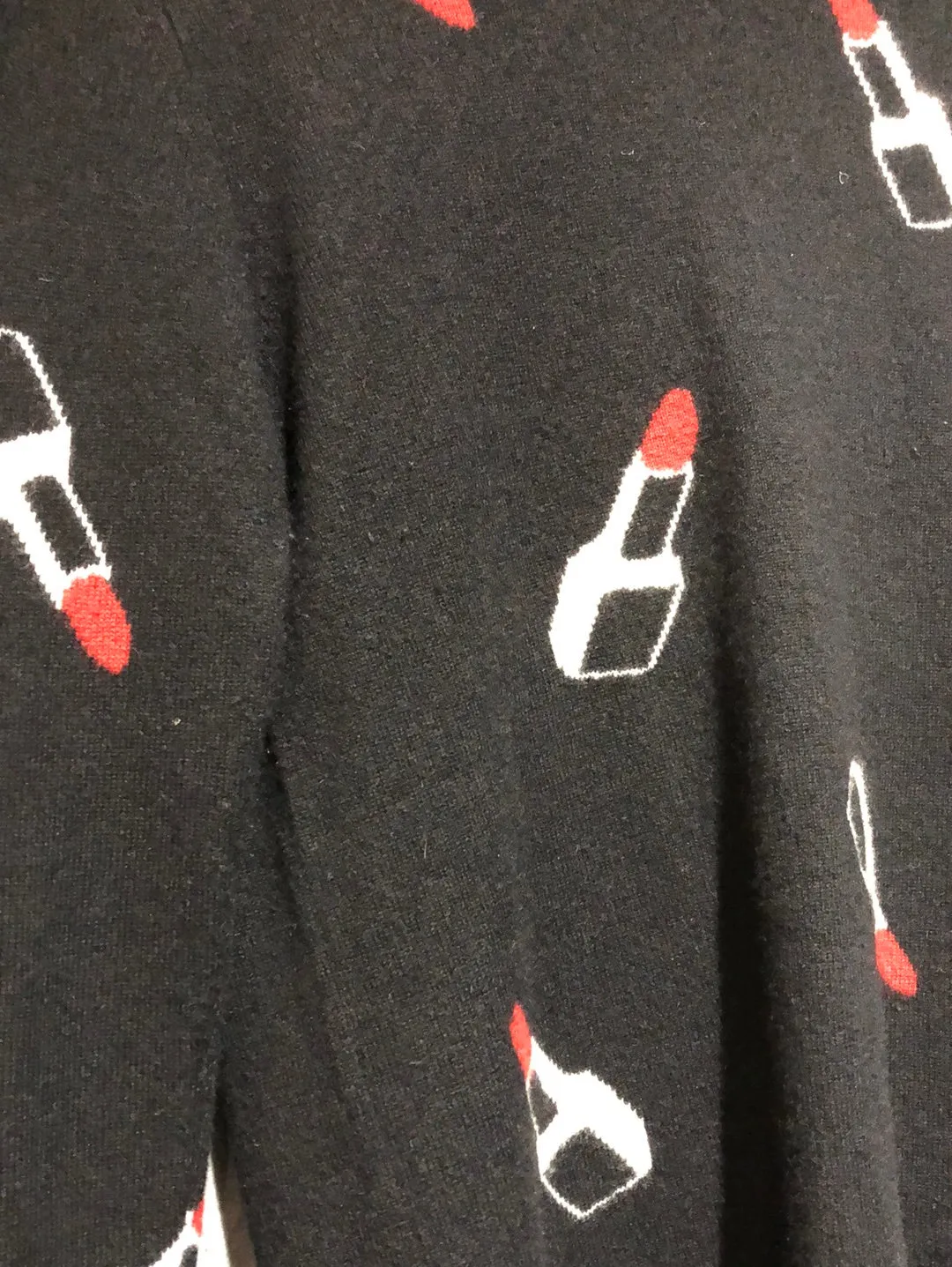 Aqua Cashmere Black Crew Neck Sweater with Lipstick
