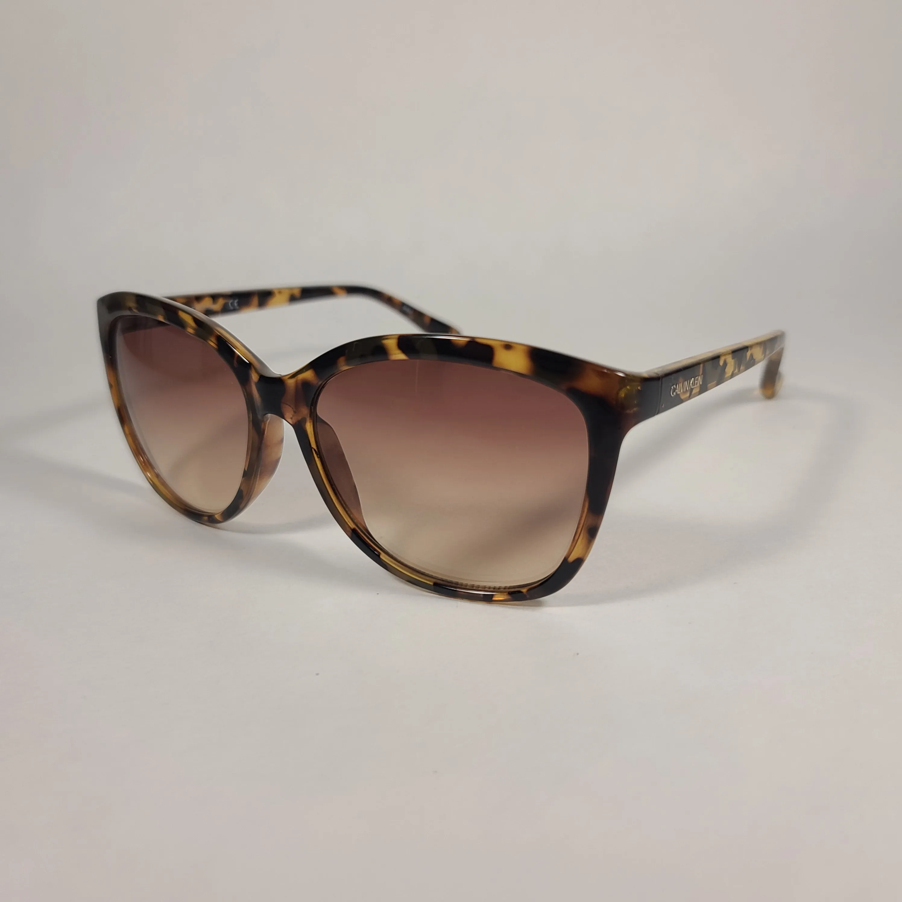 Calvin Klein Cat Eye Sunglasses CK19542S 235 Brown Tortoise Frame Brown Gradient Lens