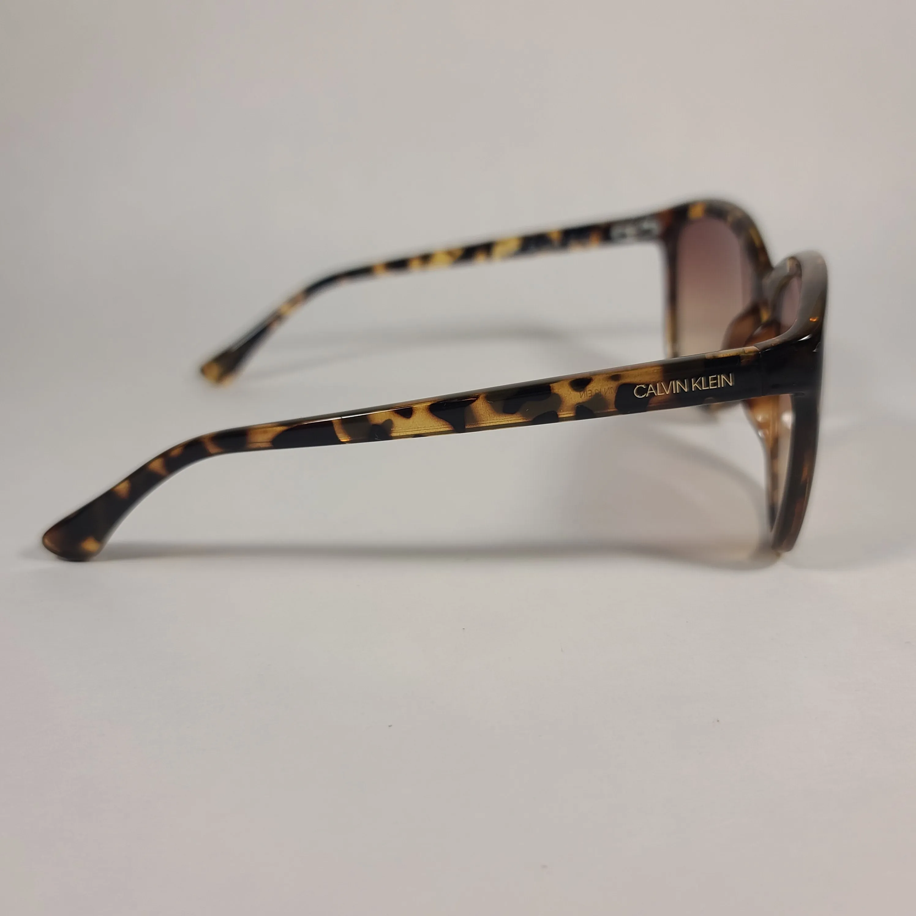 Calvin Klein Cat Eye Sunglasses CK19542S 235 Brown Tortoise Frame Brown Gradient Lens