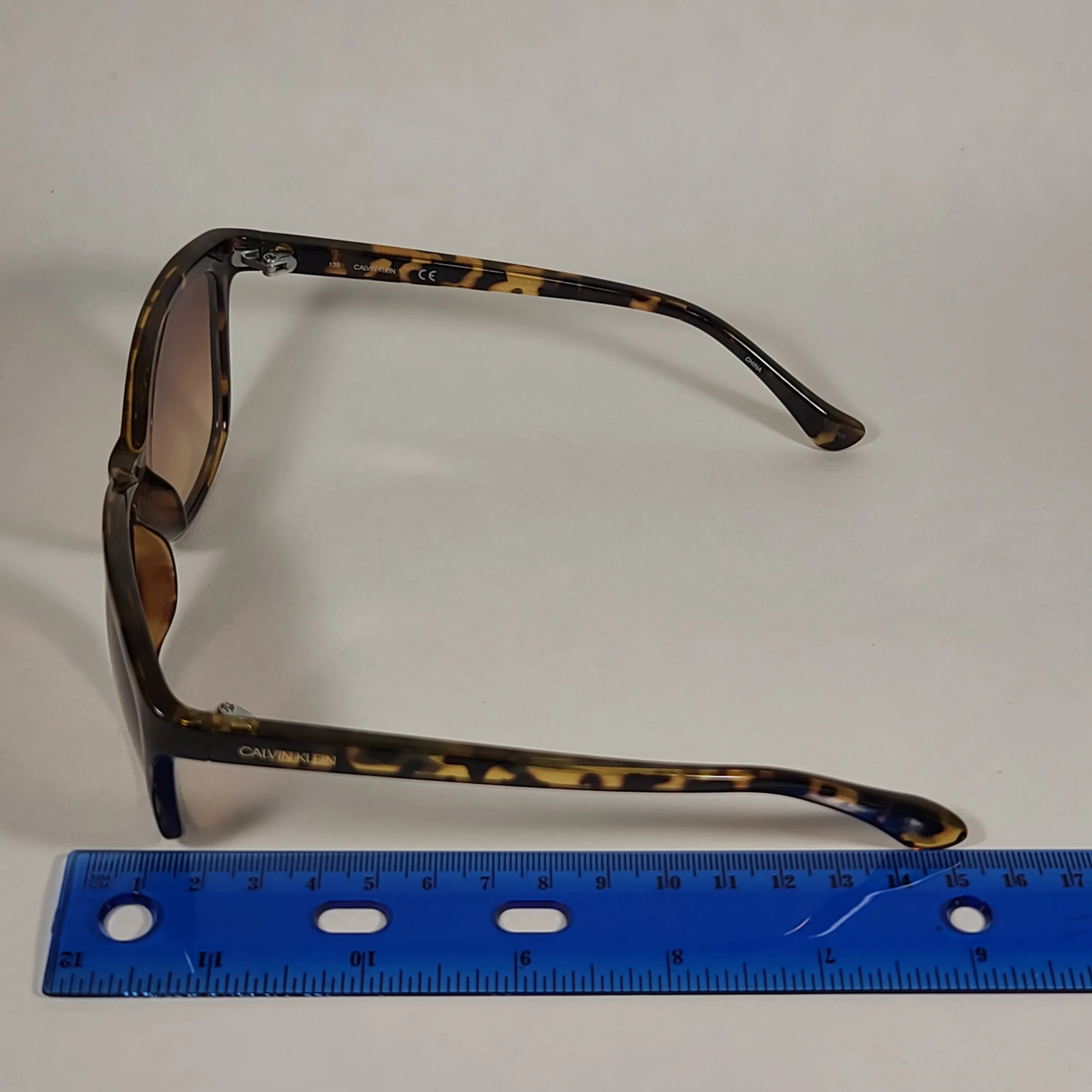 Calvin Klein Cat Eye Sunglasses CK19542S 235 Brown Tortoise Frame Brown Gradient Lens