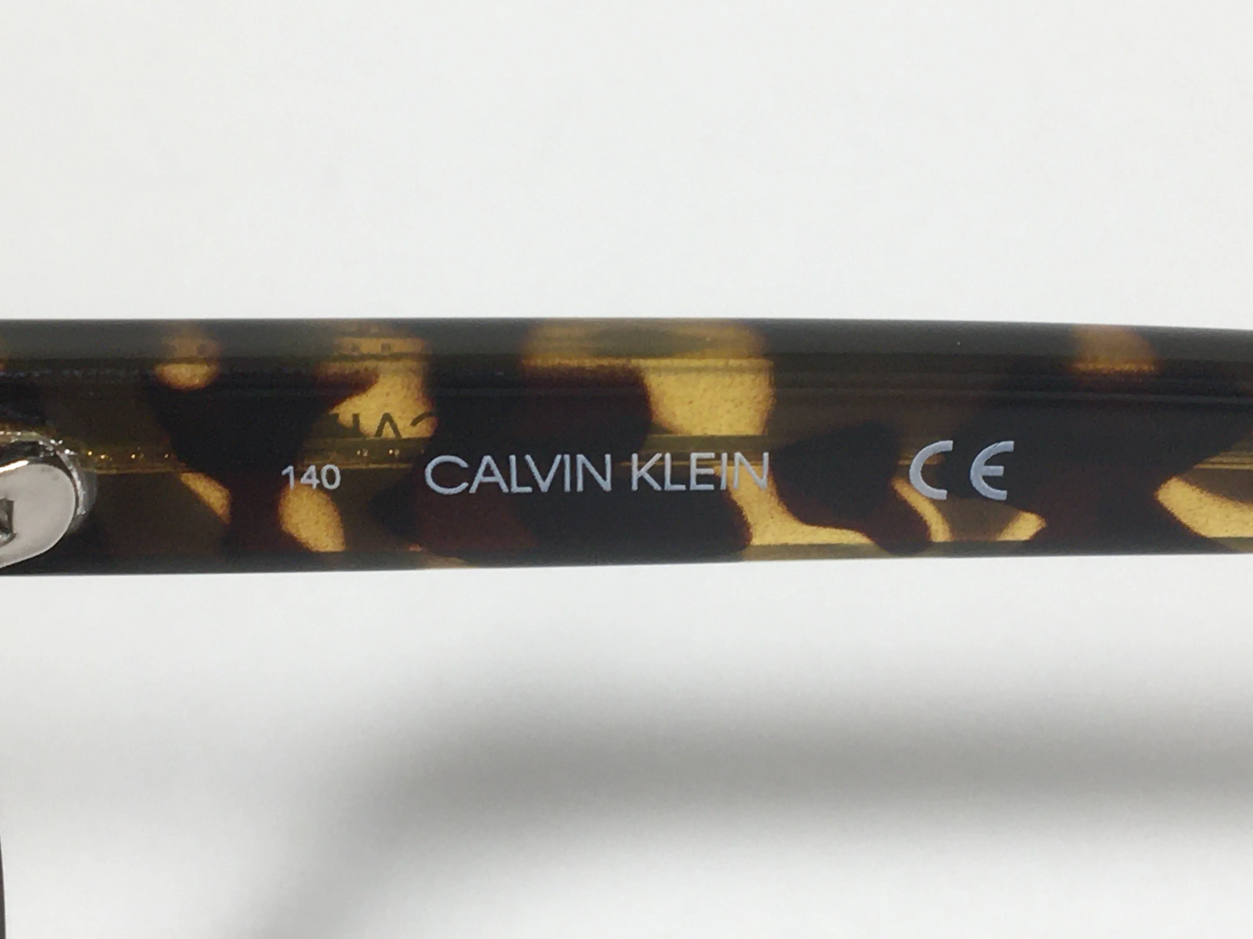 Calvin Klein Cat Eye Sunglasses CK19560S 235 Brown Tortoise Frame Brown Gradient Lens