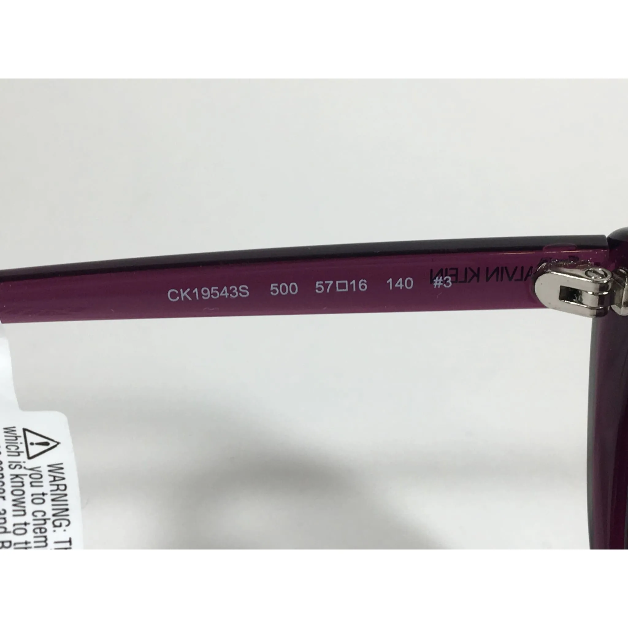 Calvin Klein CK19543S 500  Cat Eye Sunglasses Purple Frame Smoke Gradient Lens