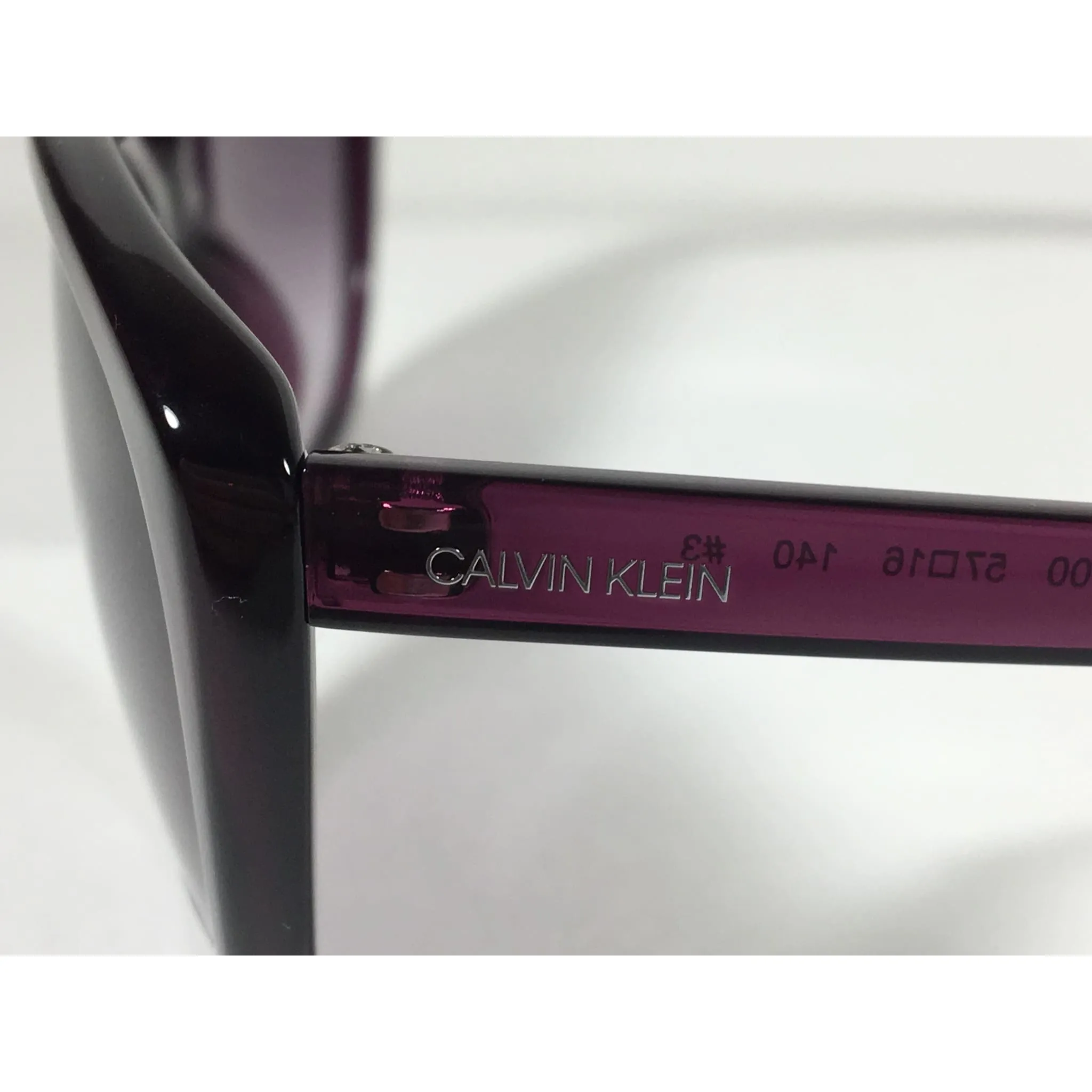 Calvin Klein CK19543S 500  Cat Eye Sunglasses Purple Frame Smoke Gradient Lens