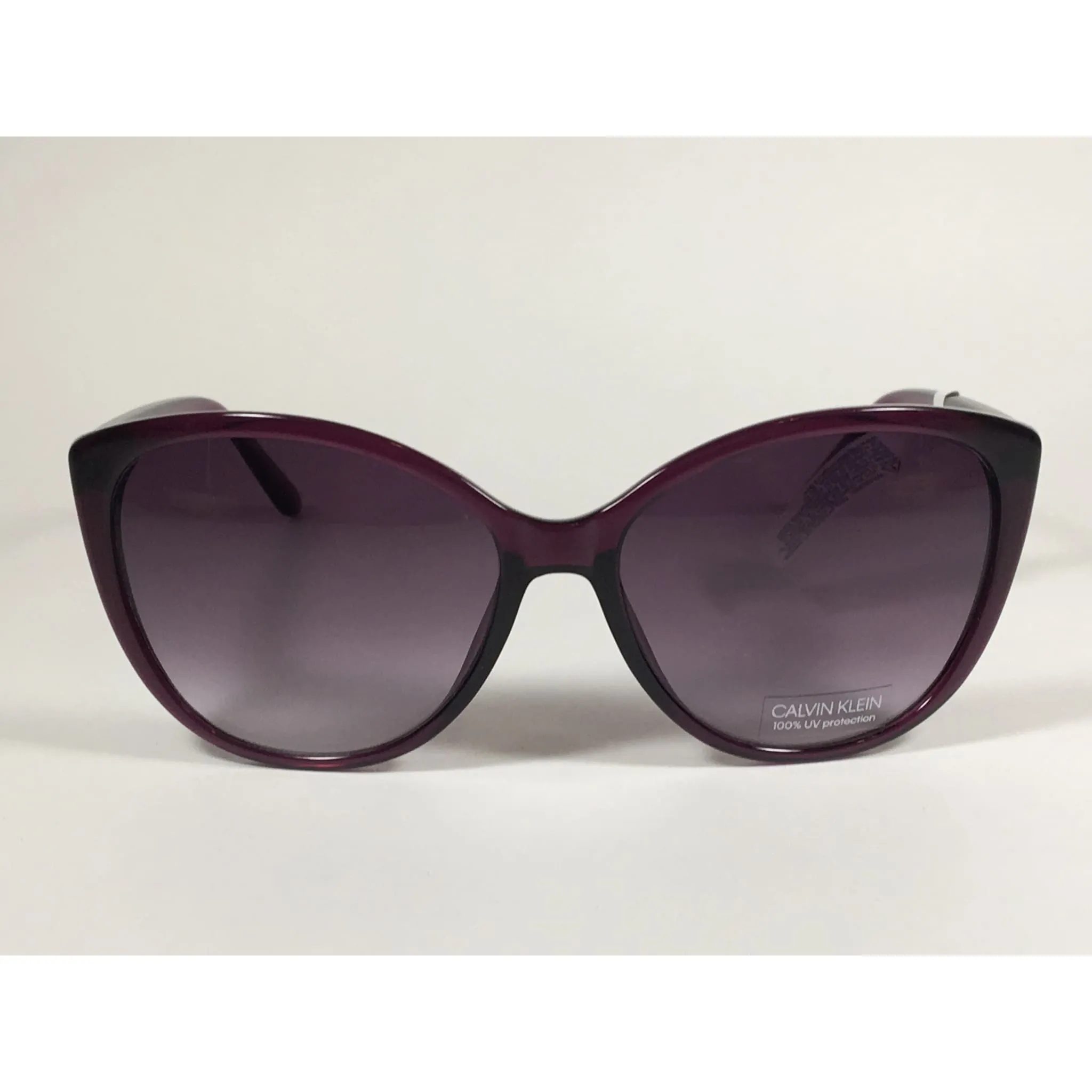 Calvin Klein CK19543S 500  Cat Eye Sunglasses Purple Frame Smoke Gradient Lens