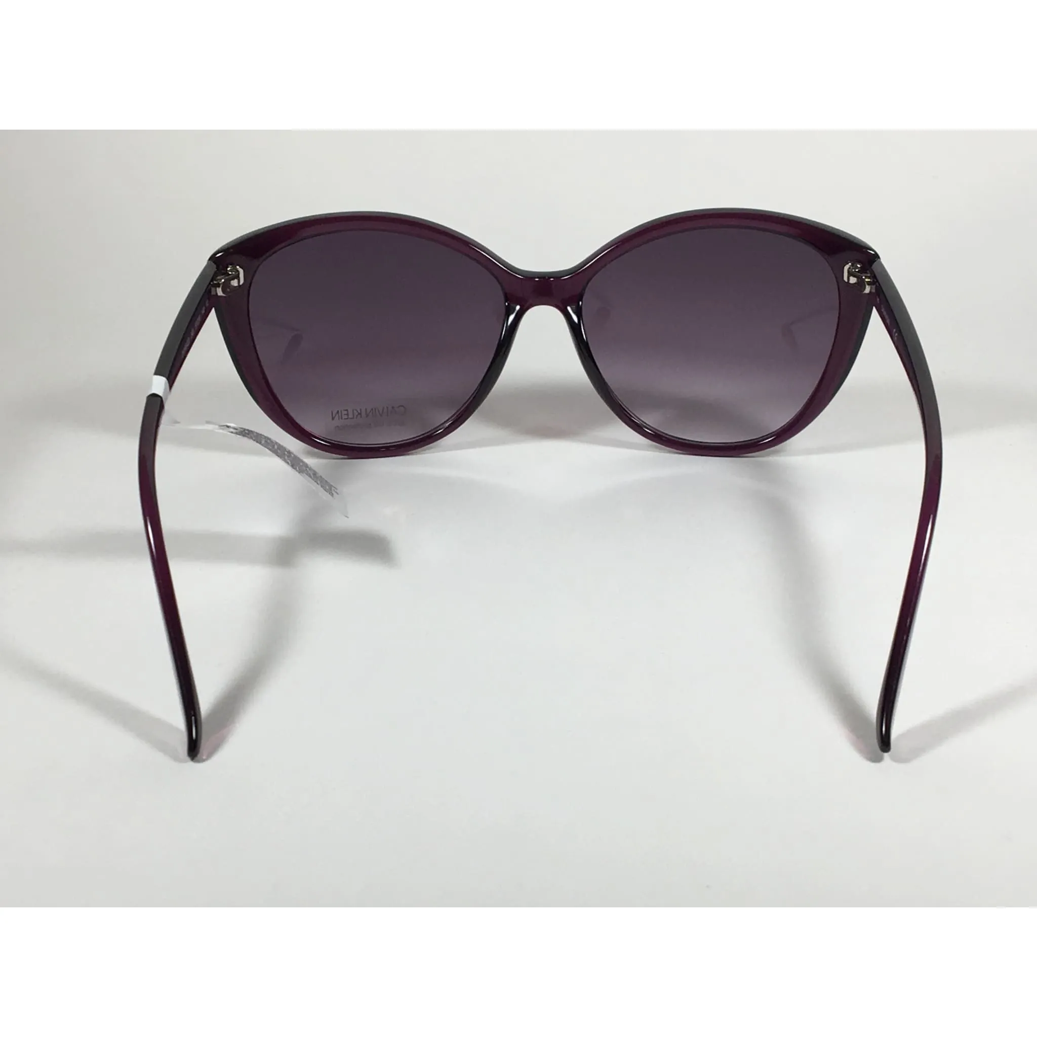 Calvin Klein CK19543S 500  Cat Eye Sunglasses Purple Frame Smoke Gradient Lens