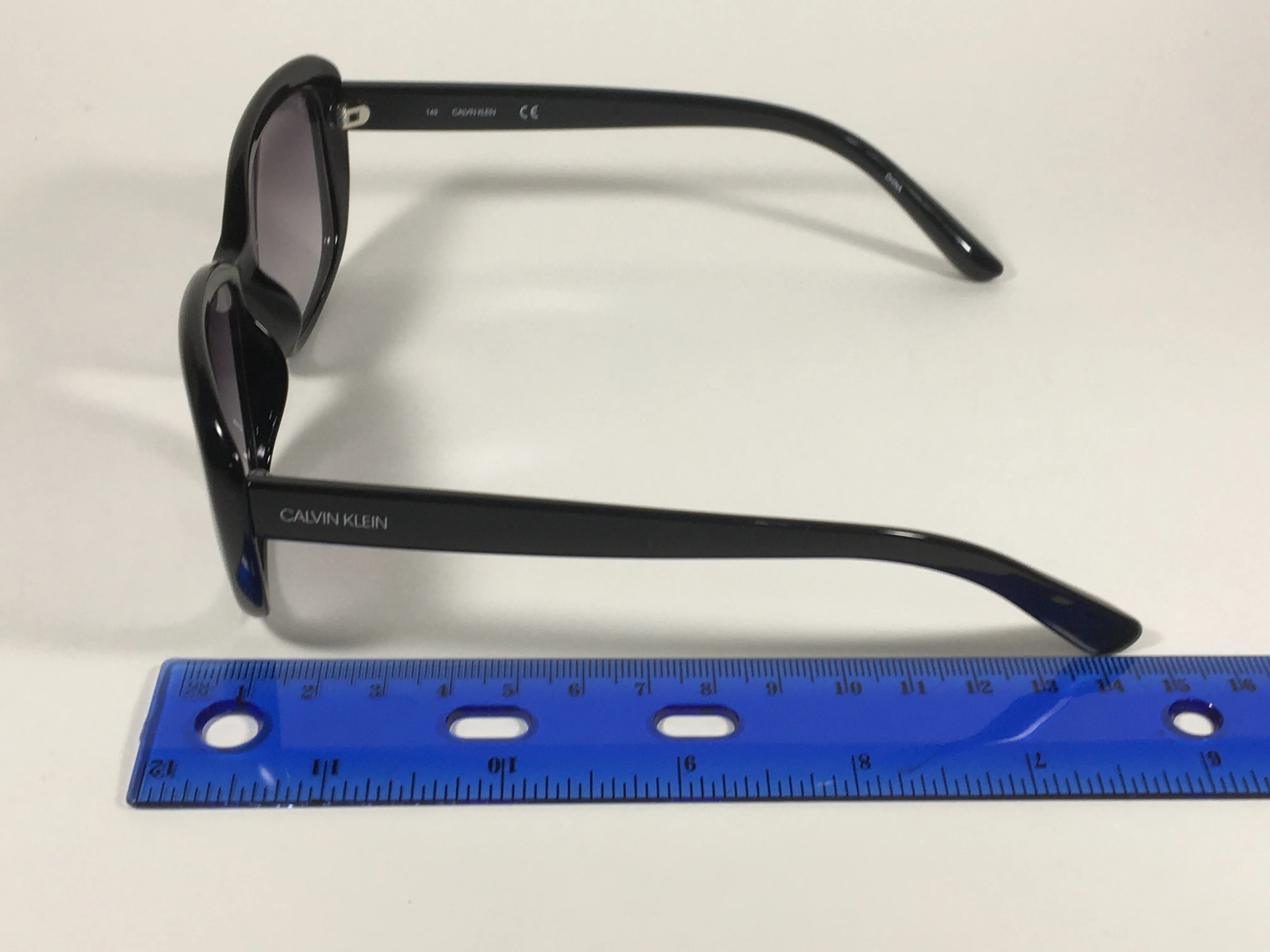 Calvin Klein Oval Sunglasses CK19541S 001 Black Gloss Frame Gray Smoke Gradient Lens