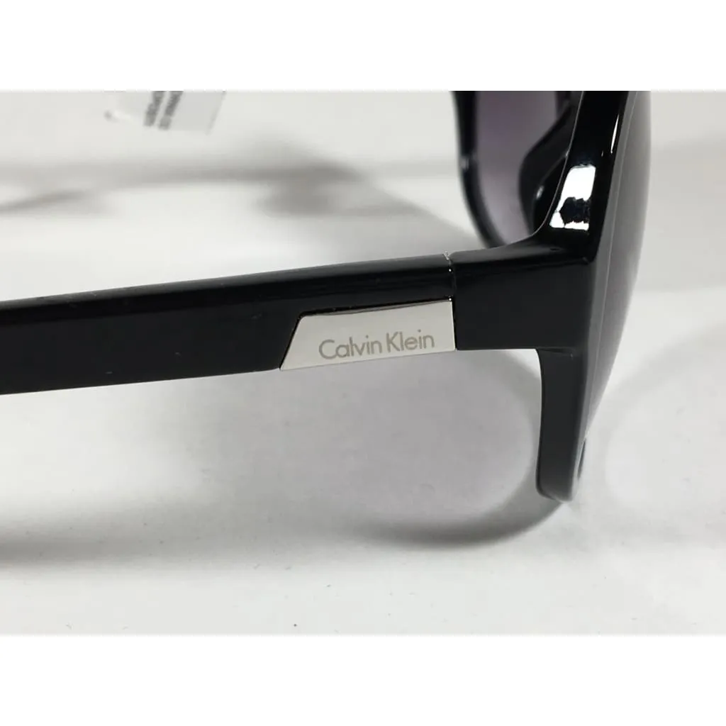 Calvin Klein R701S 001 Oval Sunglasses Black Gloss Frame Gray Gradient Lens