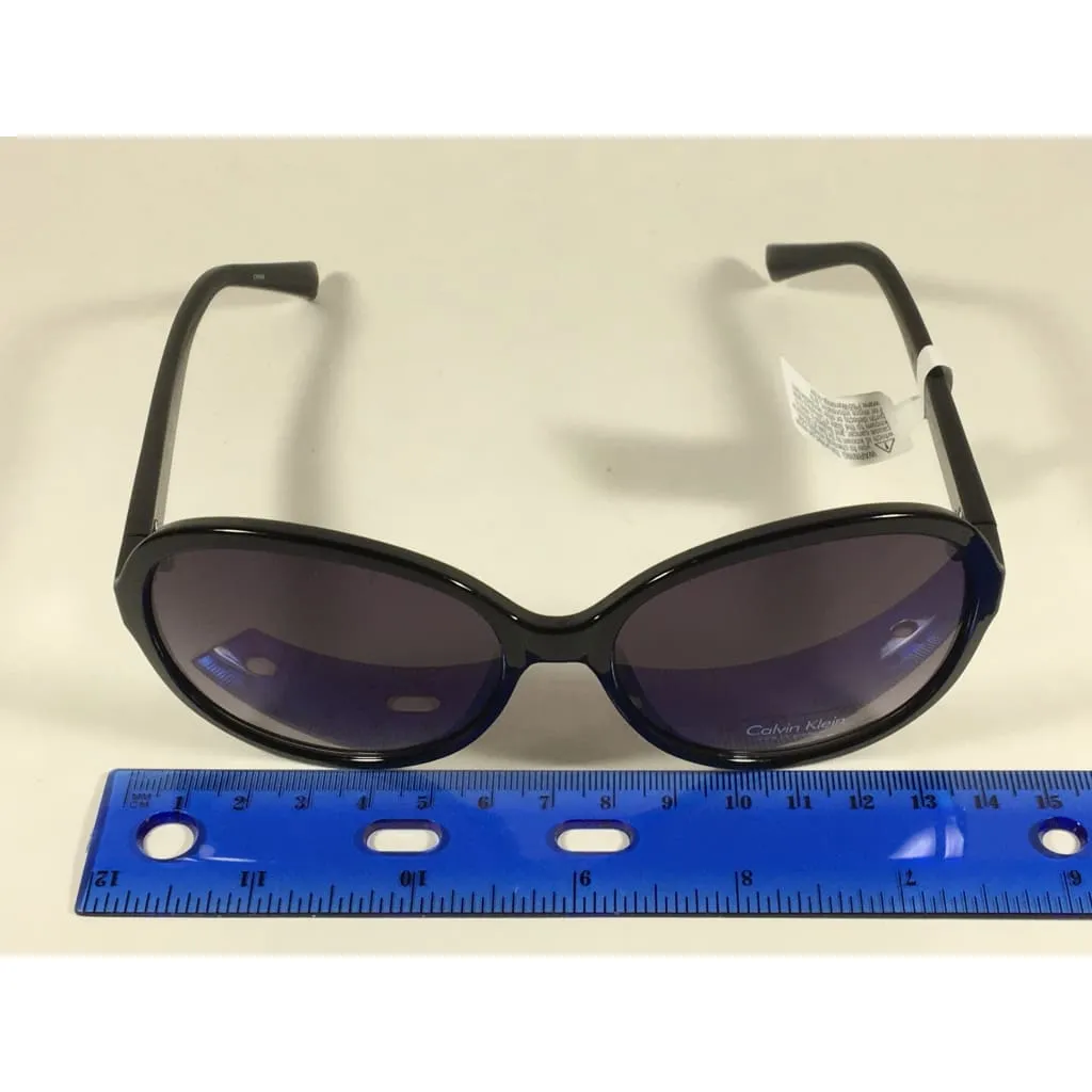 Calvin Klein R701S 001 Oval Sunglasses Black Gloss Frame Gray Gradient Lens