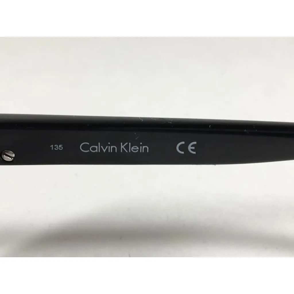Calvin Klein R701S 001 Oval Sunglasses Black Gloss Frame Gray Gradient Lens