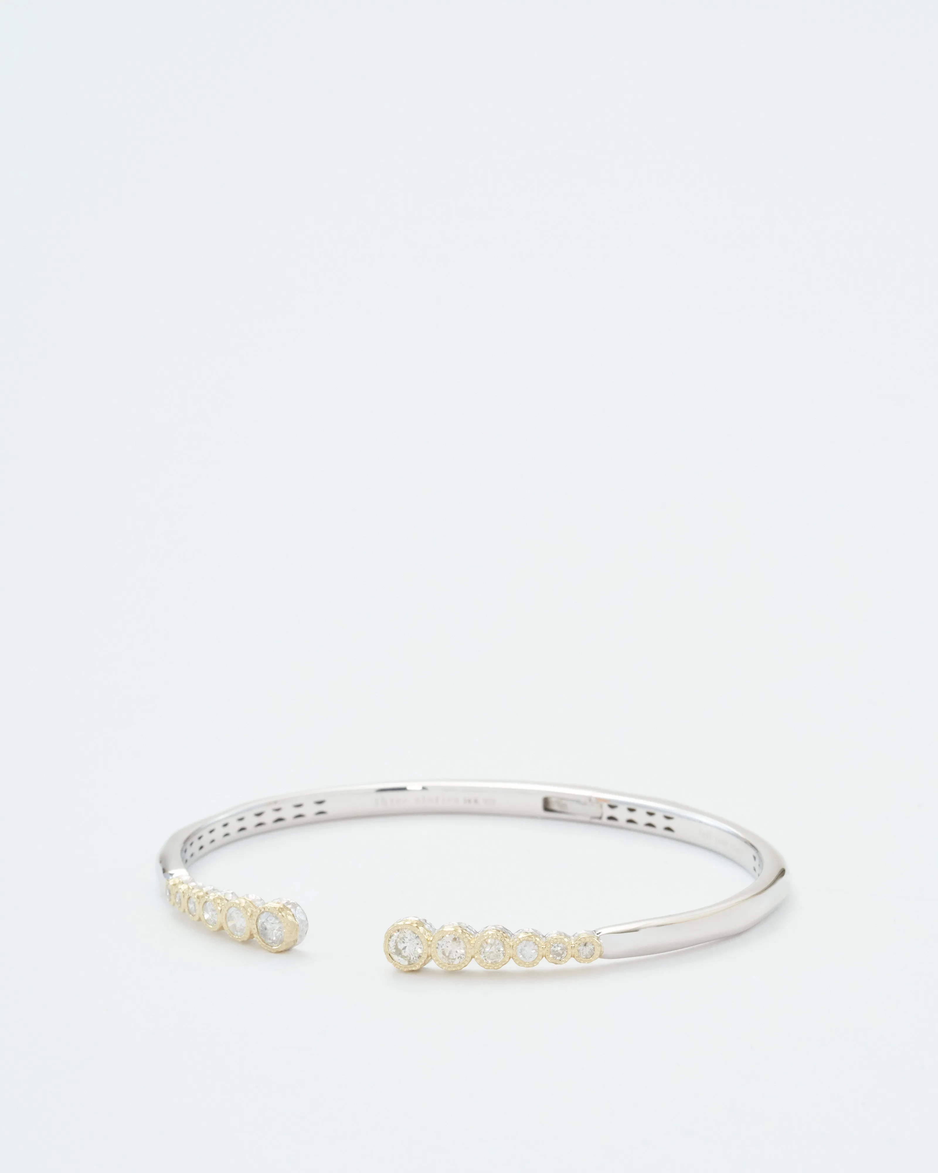 classic two-toned open bezel set diamond bangle