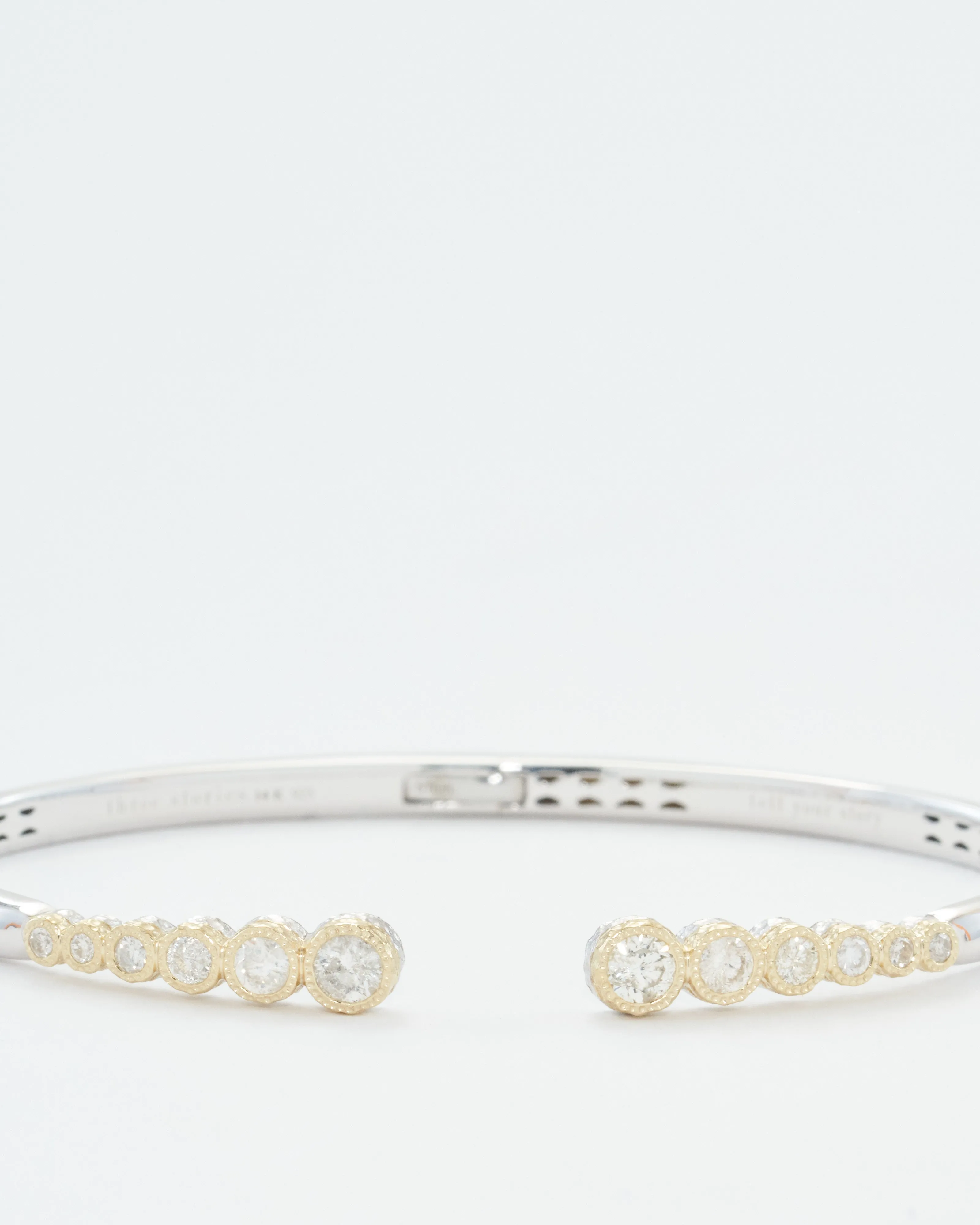 classic two-toned open bezel set diamond bangle