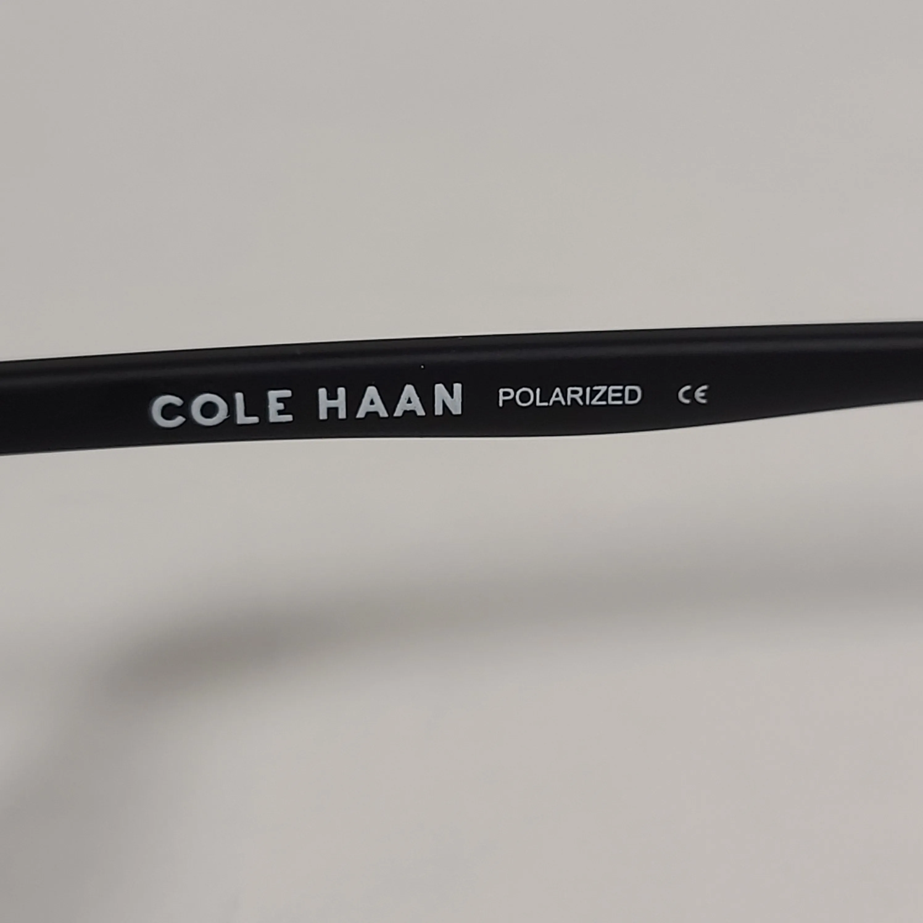 Cole Haan CH8502 001 Polarized Key Hole Sunglasses Matte Black Frame Smoke Gradient Lens