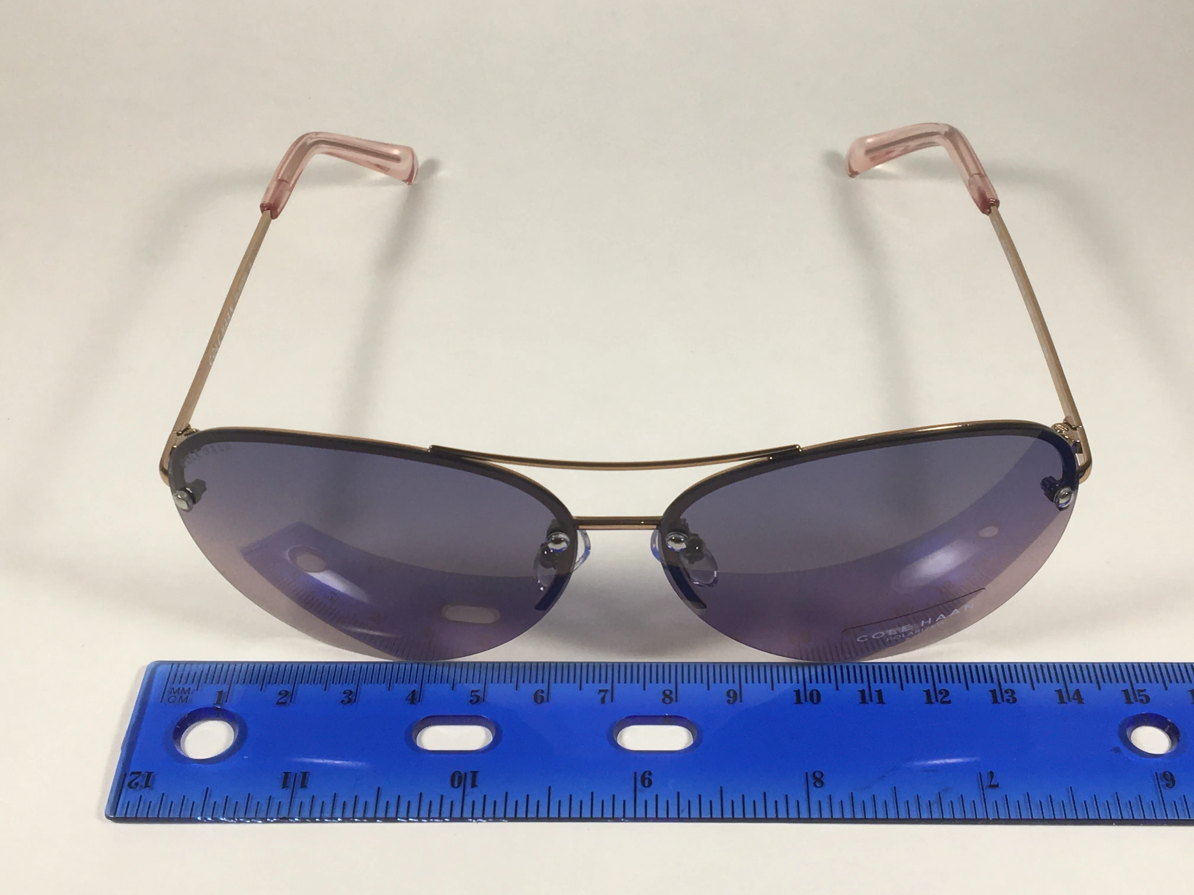 Cole Haan Polarized Rimless Aviator Sunglasses Rose Gold Frame Purple Pink Gradient Lens CH7033 605 ROSE GOLD/PINK