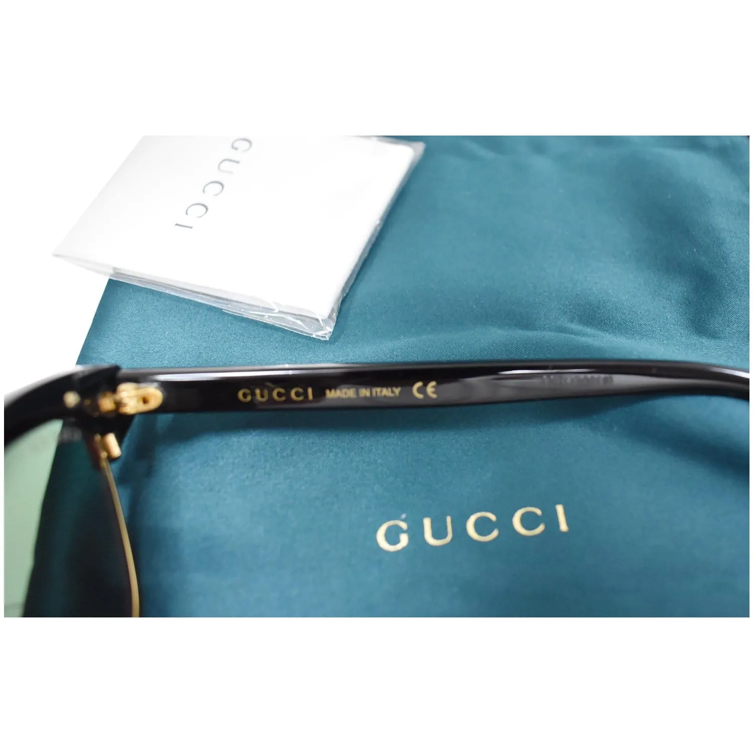 GUCCI GG0153S 001 Black Frame Cat Eye Sunglasses Pink Mirrored Lens