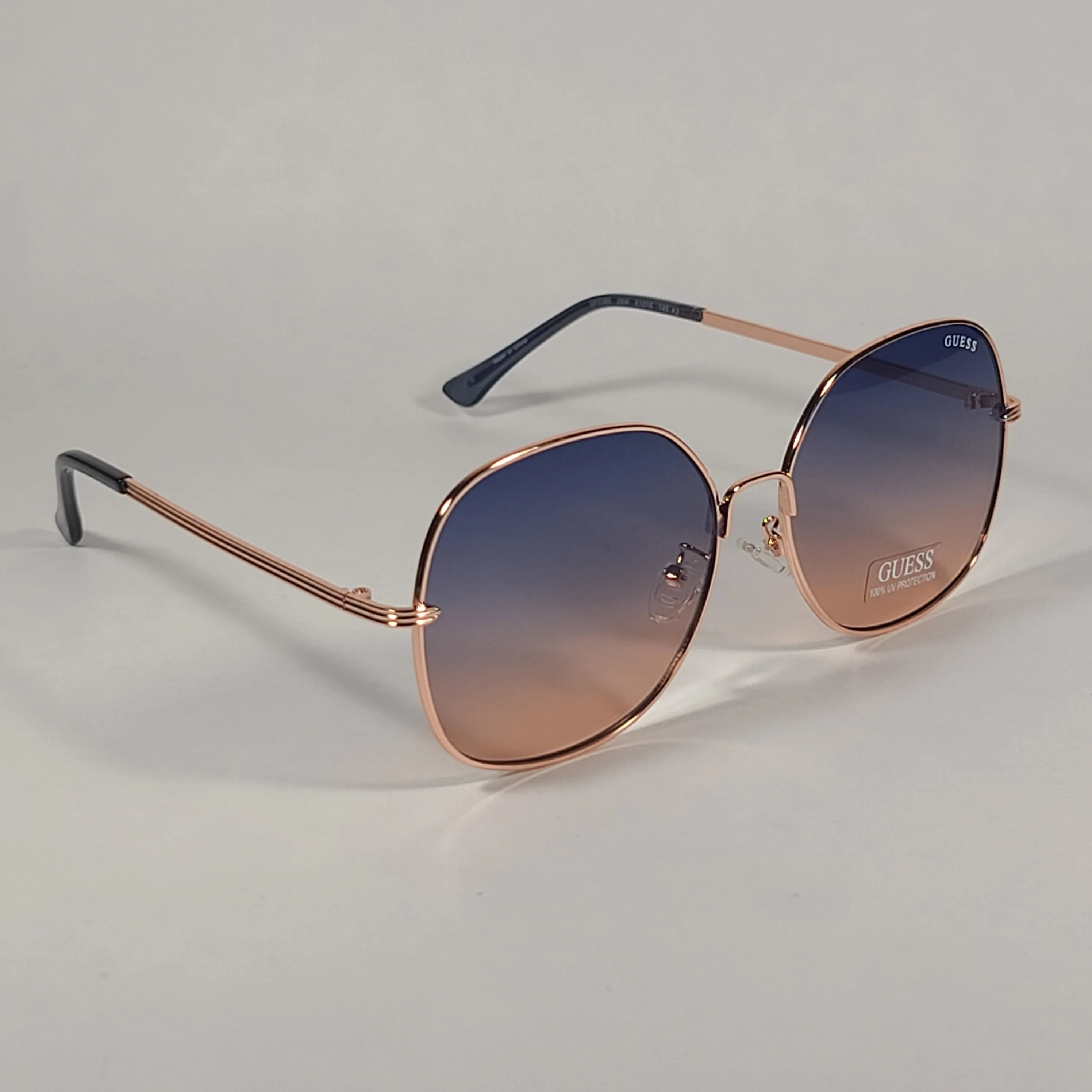 Guess Butterfly Sunglasses Rose Gold Frame Blue Gradient Lens GF0385 28W