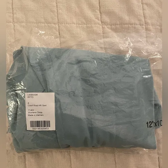 NWT Lululemon Court Rival High-Rise HR Skirt in Kohlrabi Green. Size 4.