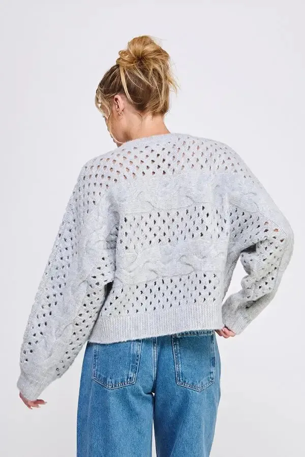 OPEN KNIT OVERSIZED SWEATER WITH CABLE KNIT DETAILS