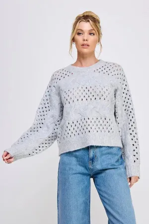 OPEN KNIT OVERSIZED SWEATER WITH CABLE KNIT DETAILS