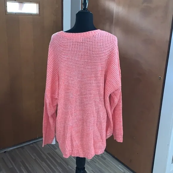 SO Coral cable knit crewneck sweater!